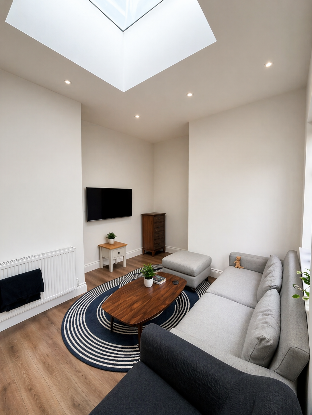 High-end residential renovation Hertfordshire — light-filled lounge with skylight in St Albans AL3 wrap-around extension