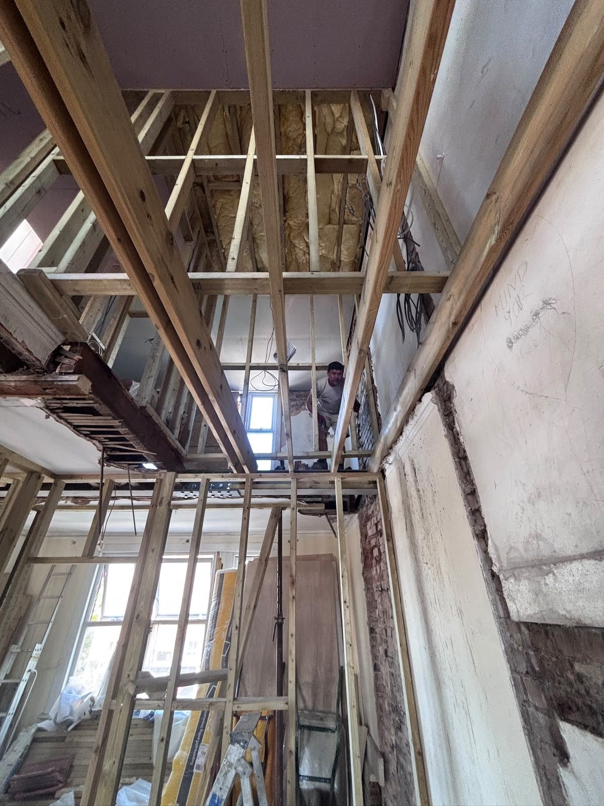 New C24 floor joists engineered over the stripped ceiling with insulation between, Friern Barnet N11